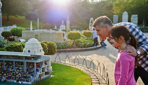 Girl and father looking at Wembley Stadium in Miniland at the LEGOLAND Windsor Resort