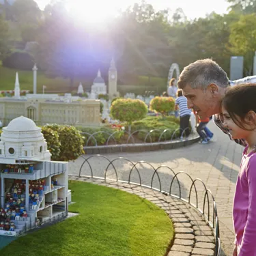 Girl and father looking at Wembley Stadium in Miniland at the LEGOLAND Windsor Resort