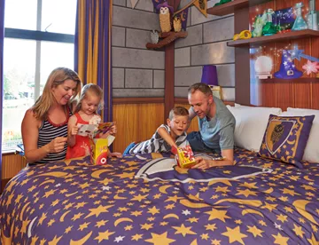 Family in Wizard's room at LEGOLAND Castle Hotel