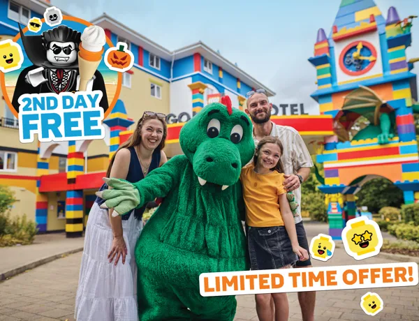 Second Day Free on Hotel Stays - Limited Time Offer! Family with Ollie the Dragon outside the LEGOLAND Windsor Hotel