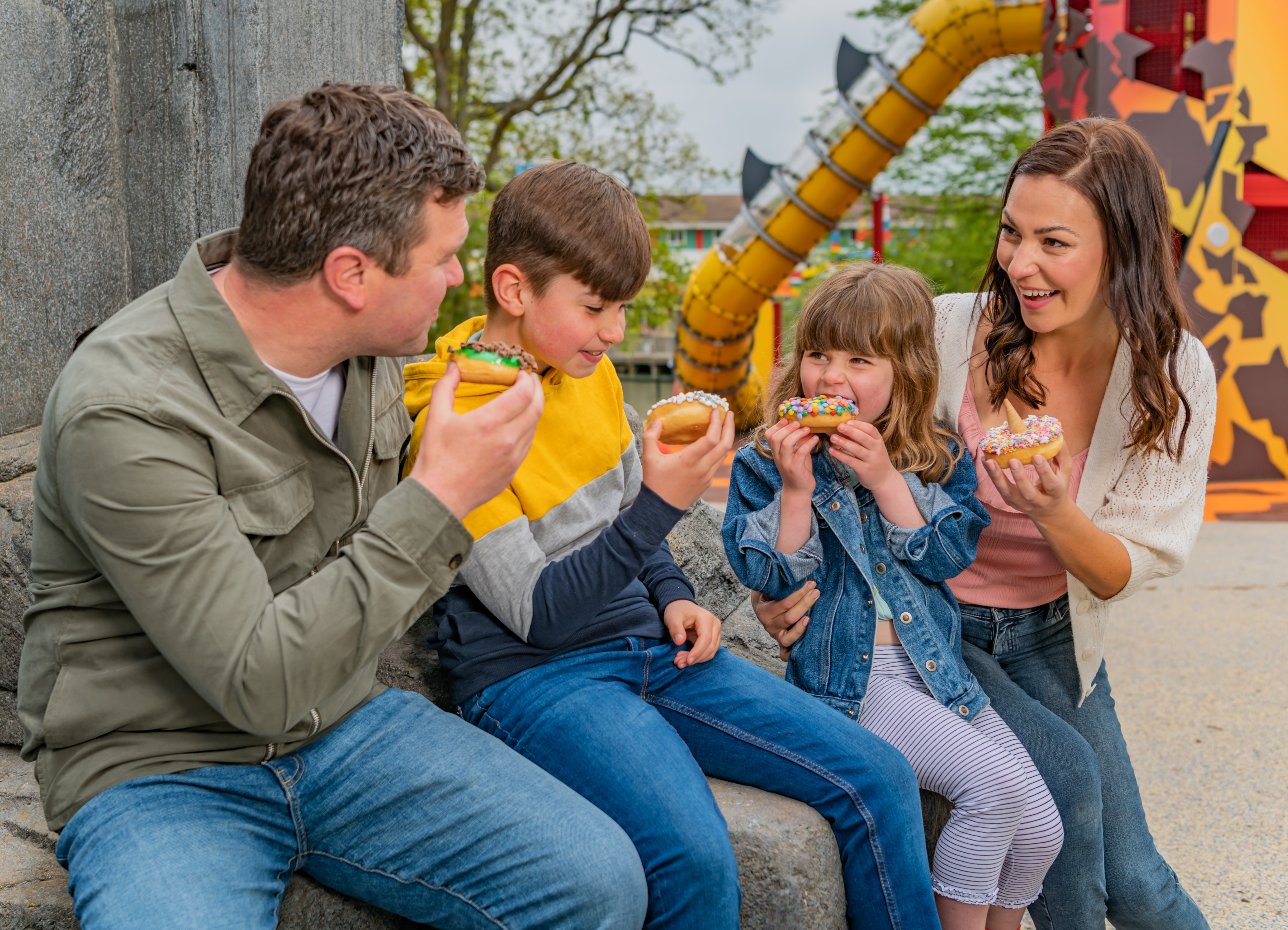 Family enjoying beastly-themed doughnuts from Beastly Bites