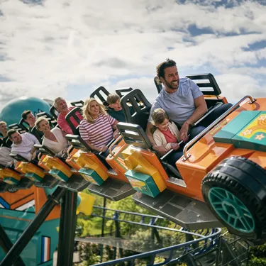 Families enjoying Minifigure Speedway at LEGOLAND Windsor