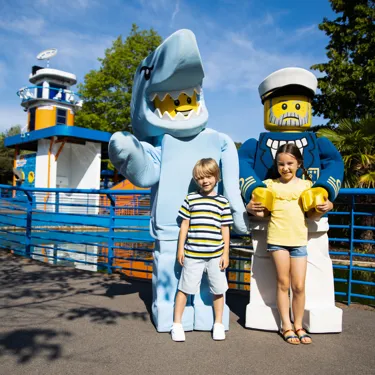 Boy and girl with Shark Guy and Sea Captain
