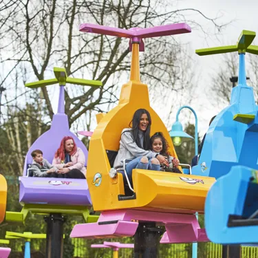 Mother and girl laughing on DUPLO Valley Airport