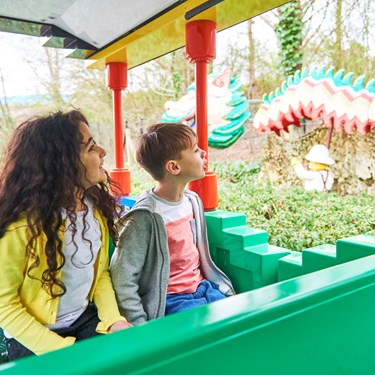 Kids looking at Dragon on the LEGOLAND Express train