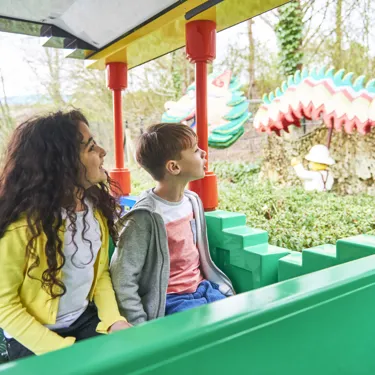 Kids looking at Dragon on the LEGOLAND Express train