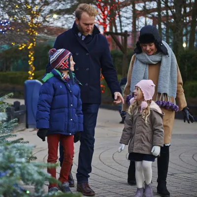 Family enjoying the magic of LEGOLAND at Christmas with Christmas trees
