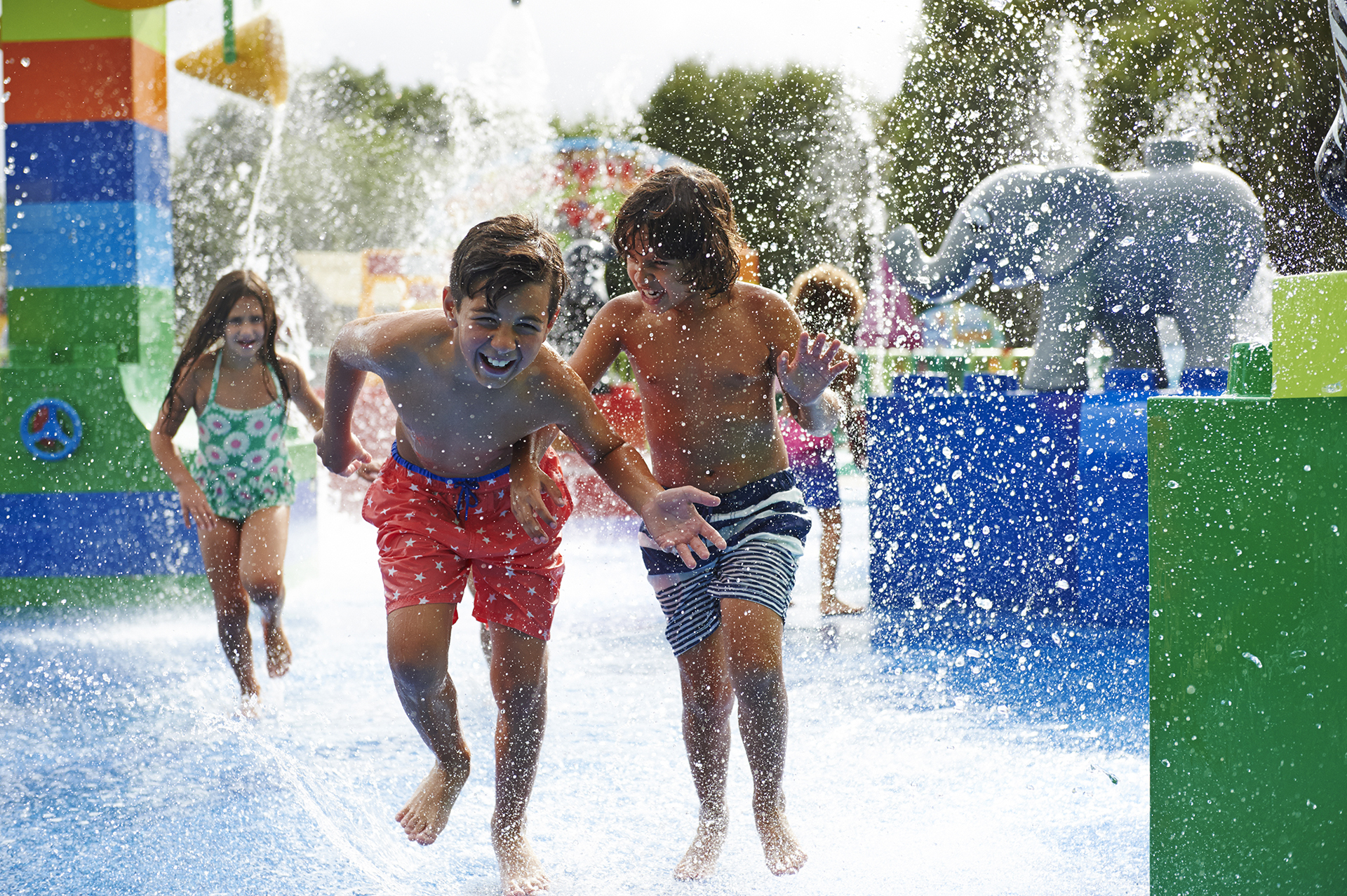 Children exploring and laughing in DUPLO® Splash Safari at the LEGOLAND® Windsor Resort