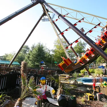 Families riding Jolly Rocker pirate ship at the LEGOLAND Windsor Resort