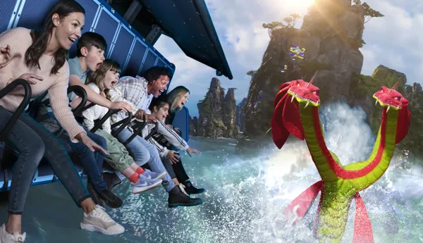 Families enjoying Flight of the Sky Lion with Duo the two-headed hydra