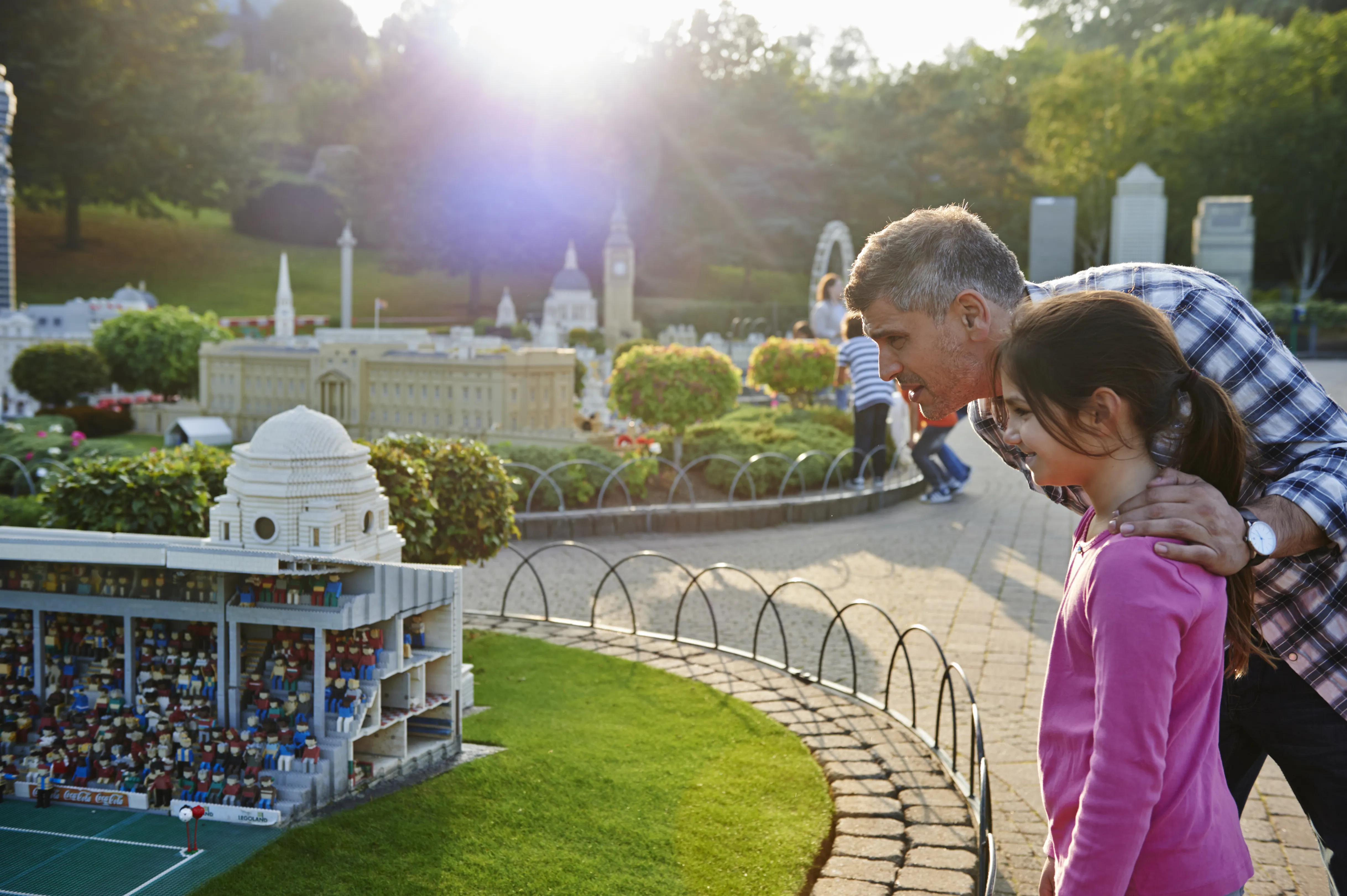 Girl and father looking at Wembley Stadium in Miniland at the LEGOLAND Windsor Resort