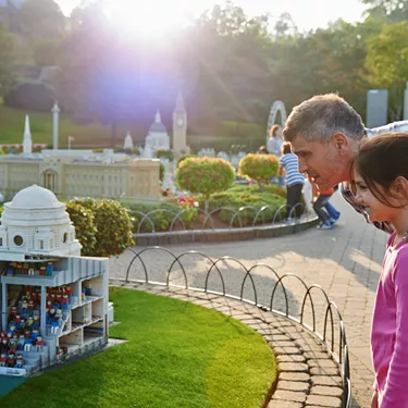 Girl and father looking at Wembley Stadium in Miniland at the LEGOLAND Windsor Resort