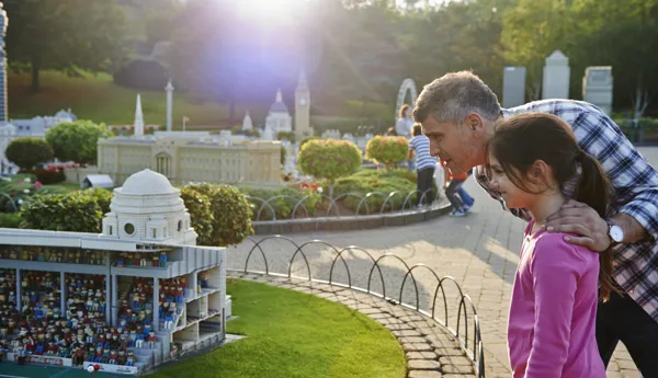 Girl and father looking at Wembley Stadium in Miniland at the LEGOLAND Windsor Resort