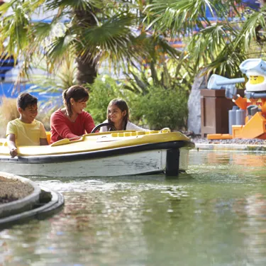 Family on boat with LEGO diver minifigures at Coastguard HQ at the LEGOLAND Windsor Resort