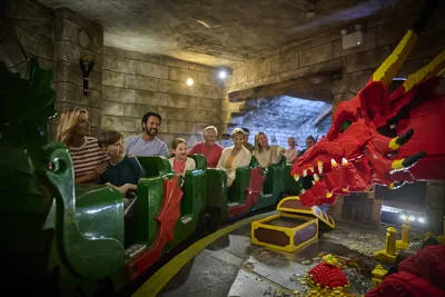 Families On The Inside Section Of The Dragon Rollercoaster At The LEGOLAND Windsor Resort
