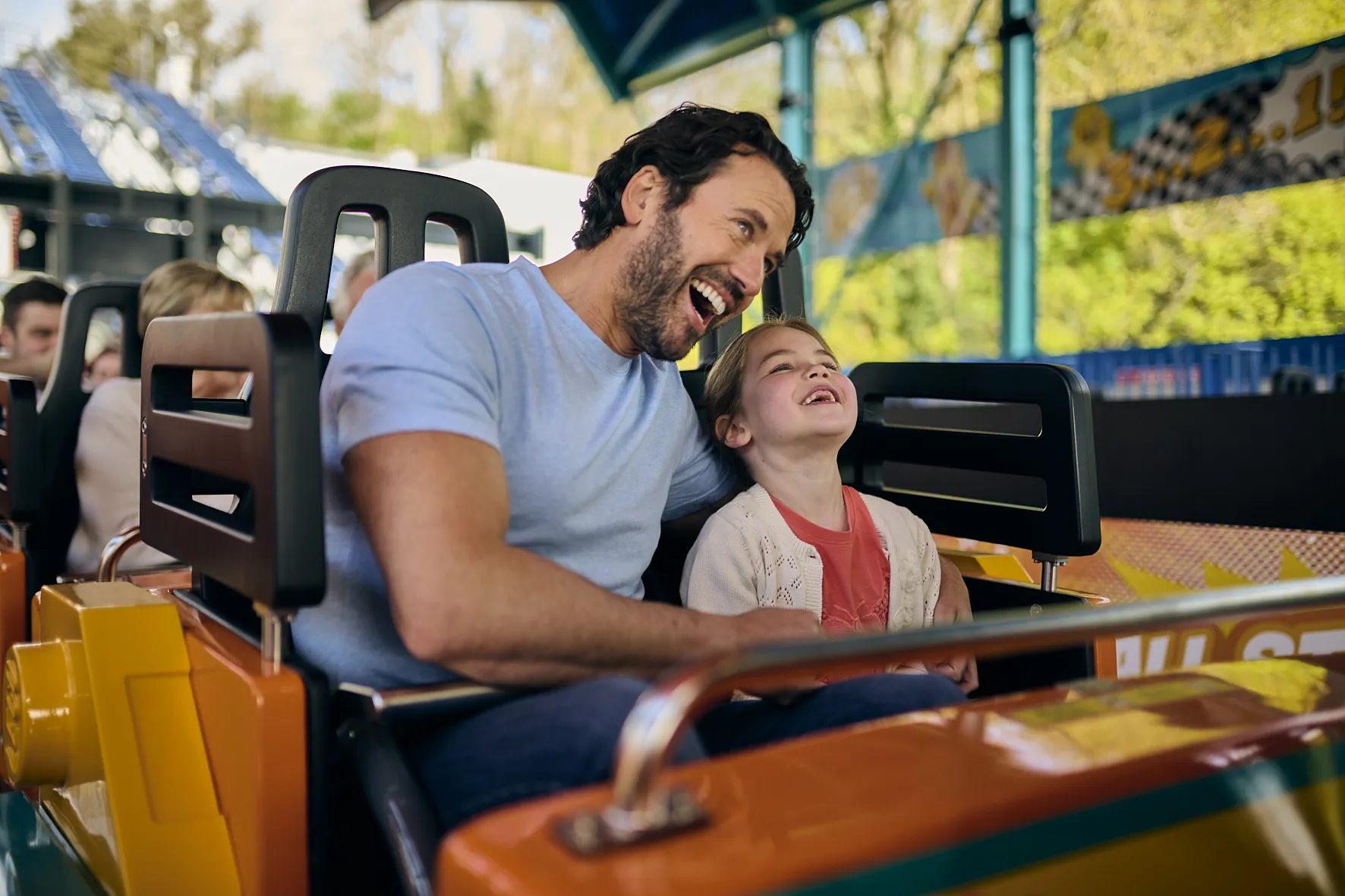 Father And Daughter On Minifigure Speedway