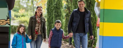 Family walking into LEGOLAND Resort Hotel