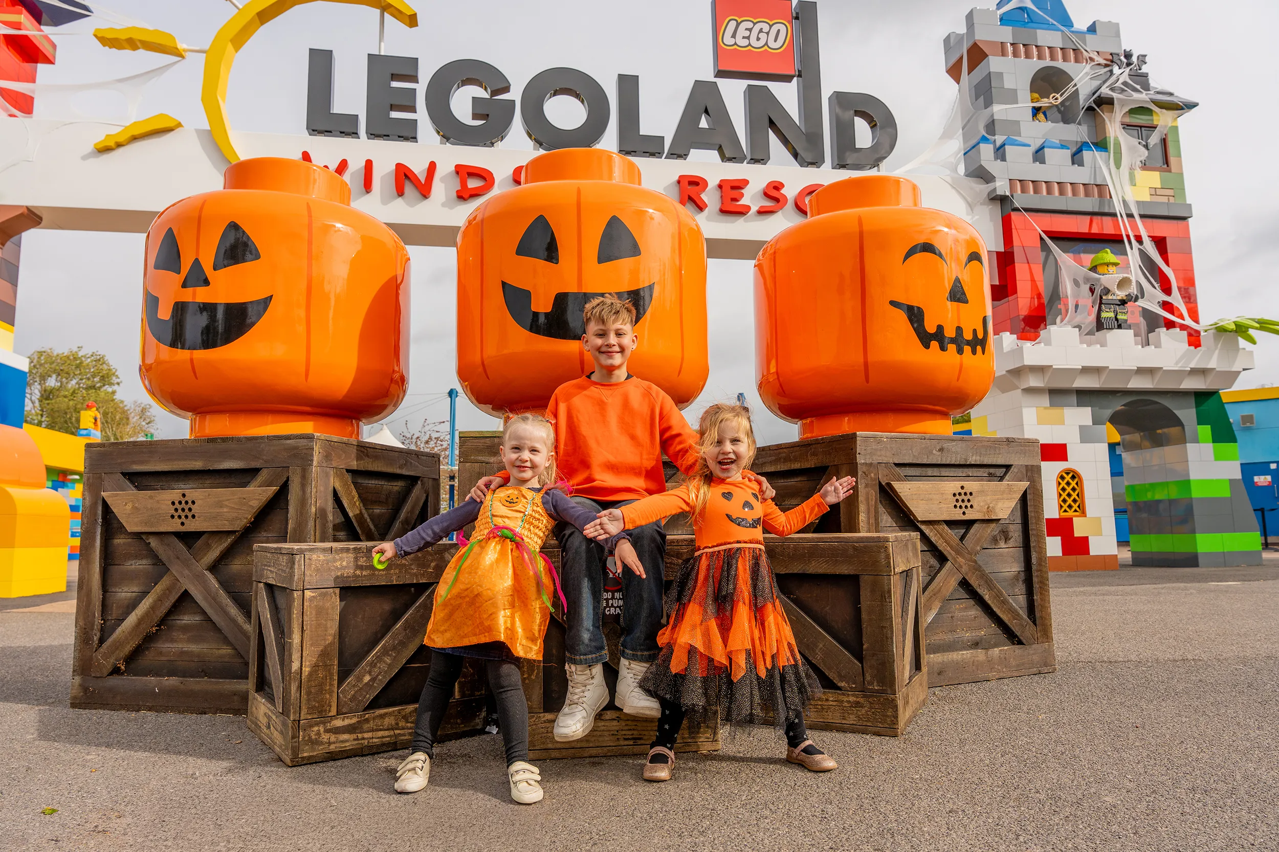 Children With LEGO Pumpkin Heads