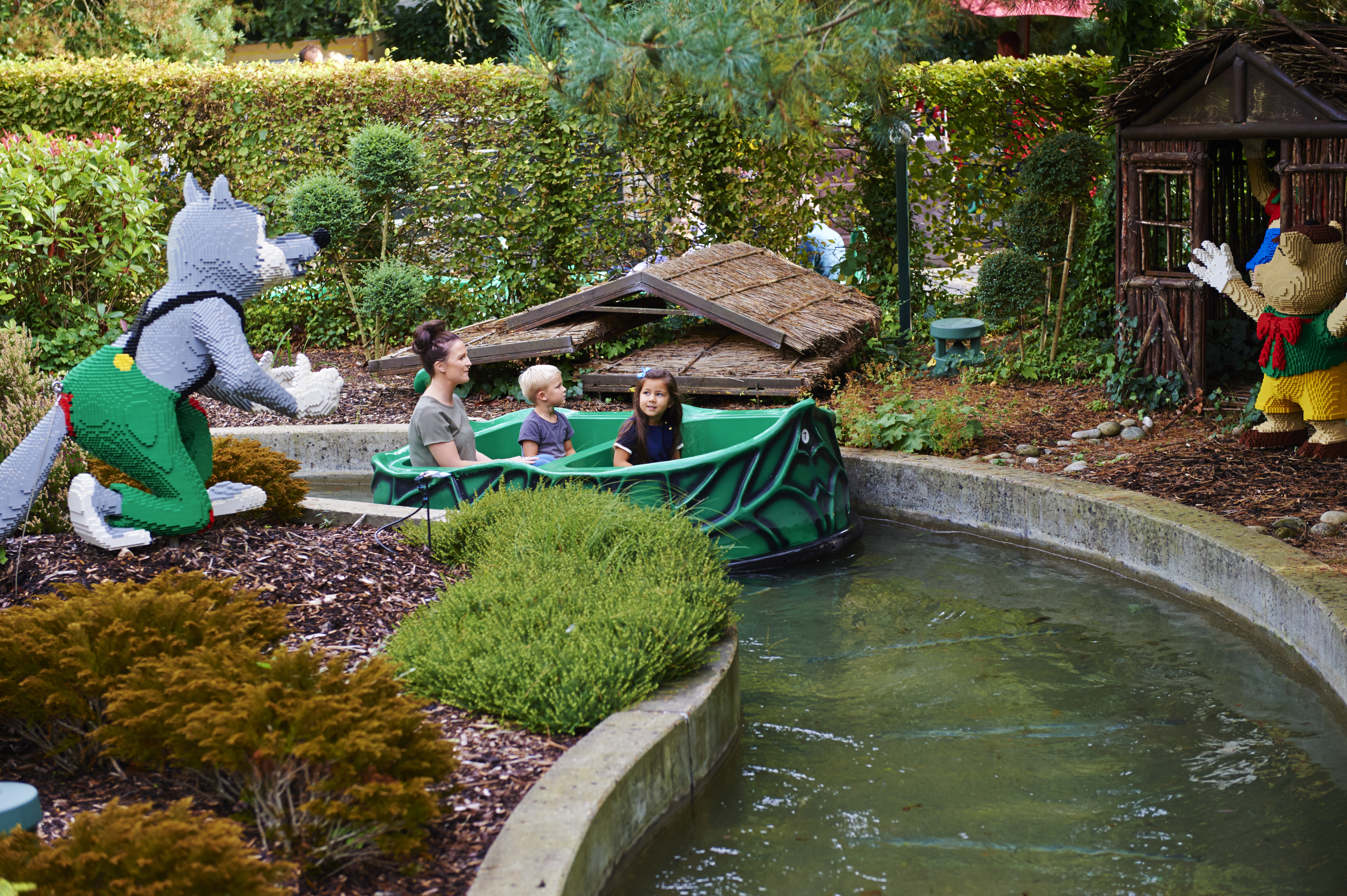 Family enjoying Fairy Tale Brook at the LEGOLAND Windsor Resort