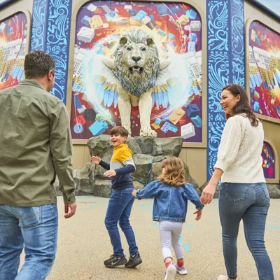 Family walking towards Maximus at Flight of the Sky Lion in LEGO MYTHICA