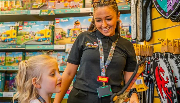 VIP Host In LEGOLAND Shop Shopping With Child