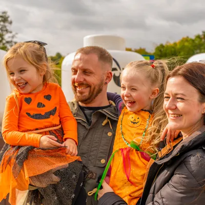 Family In Front Of LEGO Skeleton Heads at Brick or Treat at LEGOLAND Windsor