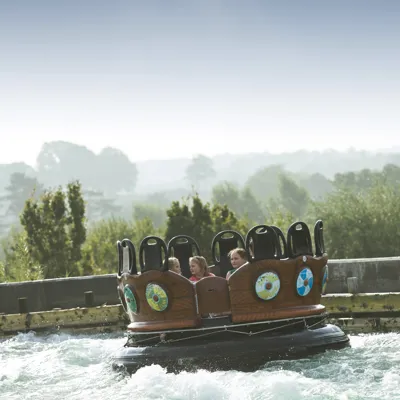 Families getting wet on Viking River Splash rapids ride
