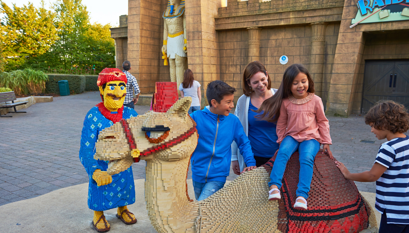 Family on LEGO Camel in Kingdom of the Pharoahs