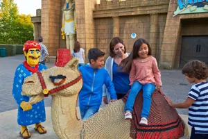 Family on LEGO Camel in Kingdom of the Pharoahs