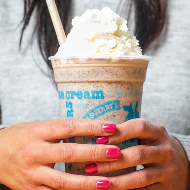 Woman with Ben & Jerry's milkshake at LEGOLAND Windsor Resort