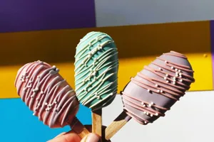 Multi-coloured decorated Cake Pops available at Heartlake Cafe