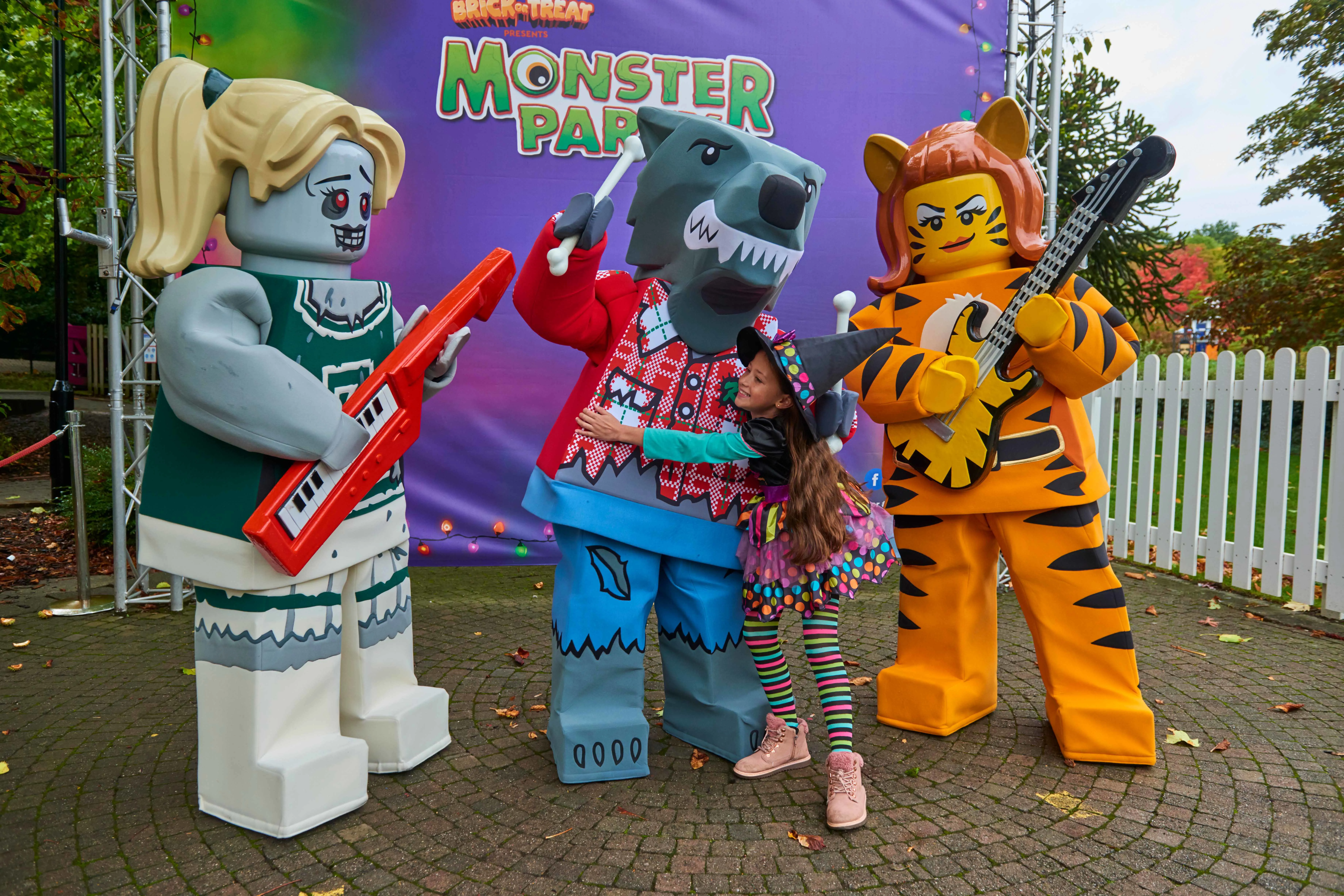 Child meeting Zombie Cheerleader, Wolf Guy & Tiger Lady