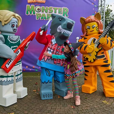 Child meeting Zombie Cheerleader, Wolf Guy & Tiger Lady