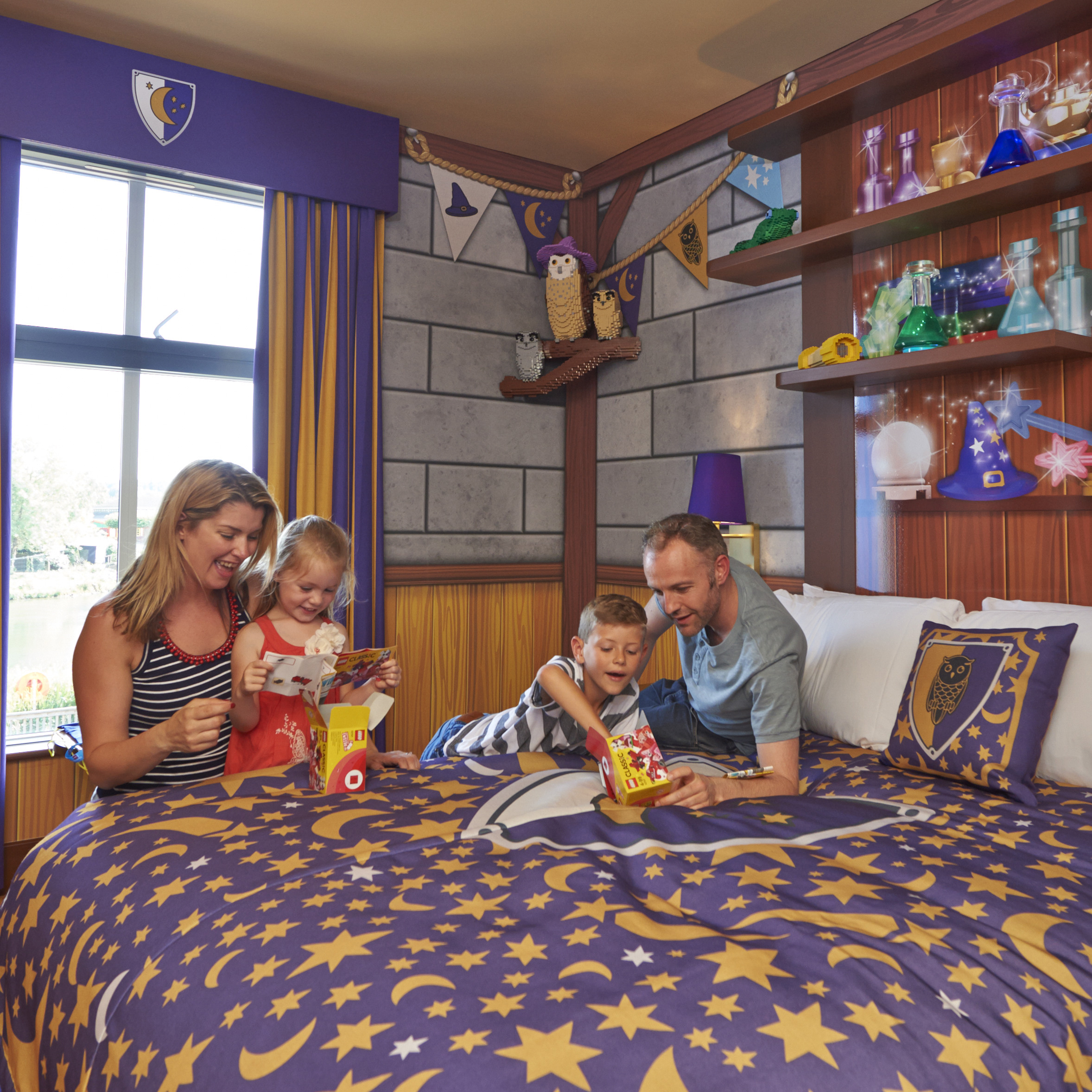 Family in Wizard's room at LEGOLAND Castle Hotel
