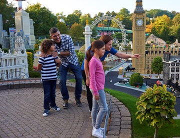 Family looking at London landmarks in Miniland at the LEGOLAND Windsor Resort