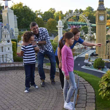 Family looking at London landmarks in Miniland at the LEGOLAND Windsor Resort