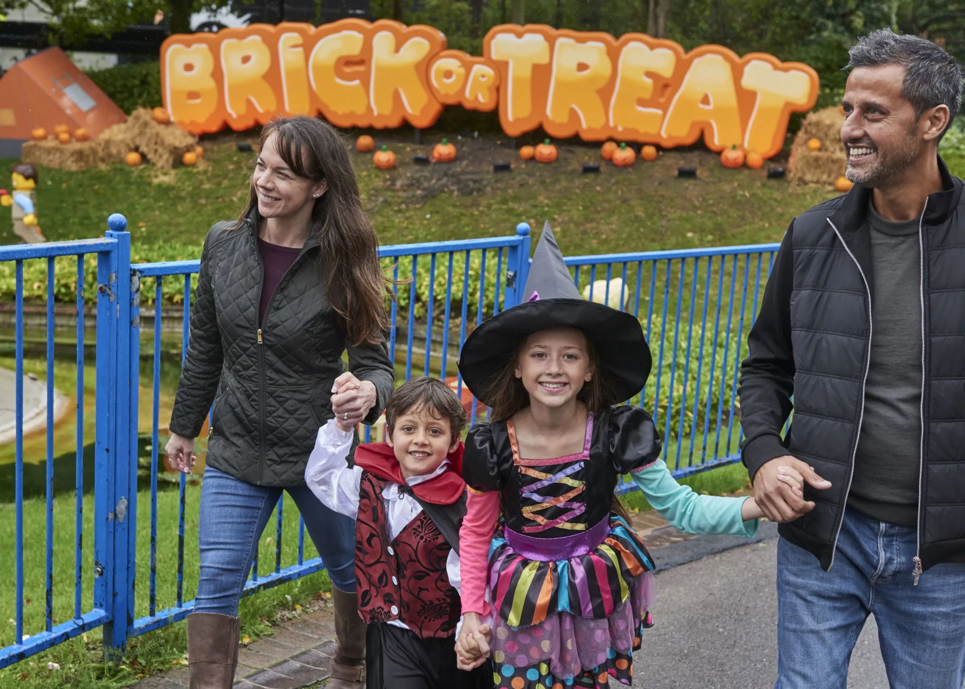 Family at entrance of Brick or Treat at LEGOLAND® Windsor Resort