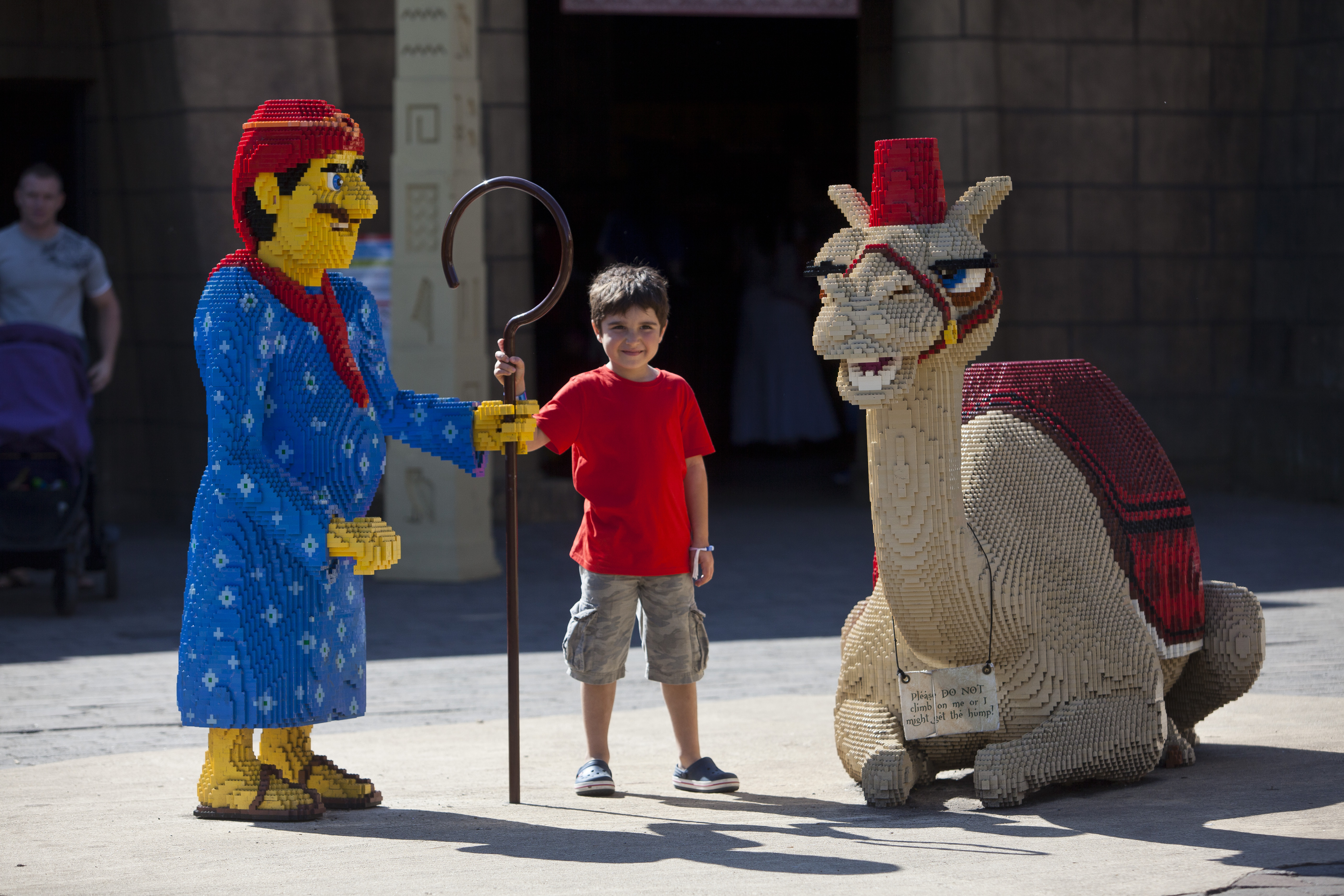 Boy next to LEGO Camel in Kingdom of the Pharaohs