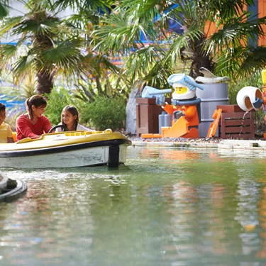 Family in boat at Coastguard HQ at the LEGOLAND Windsor Resort