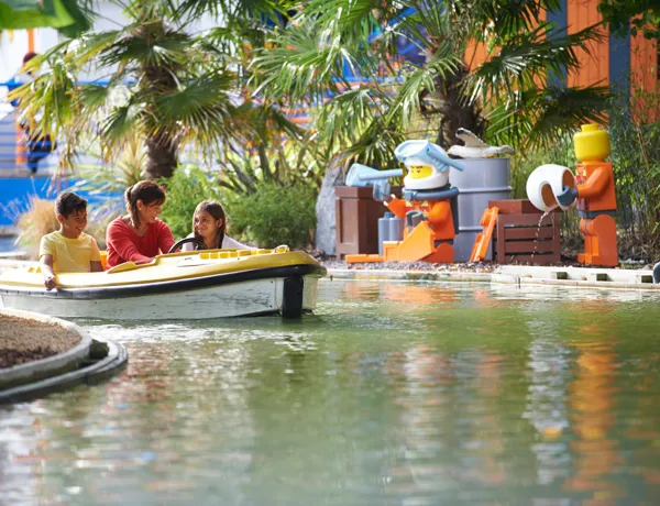 Family in boat at Coastguard HQ at the LEGOLAND Windsor Resort