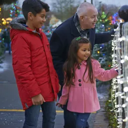 Family looking at Christmas lights at LEGOLAND at Christmas