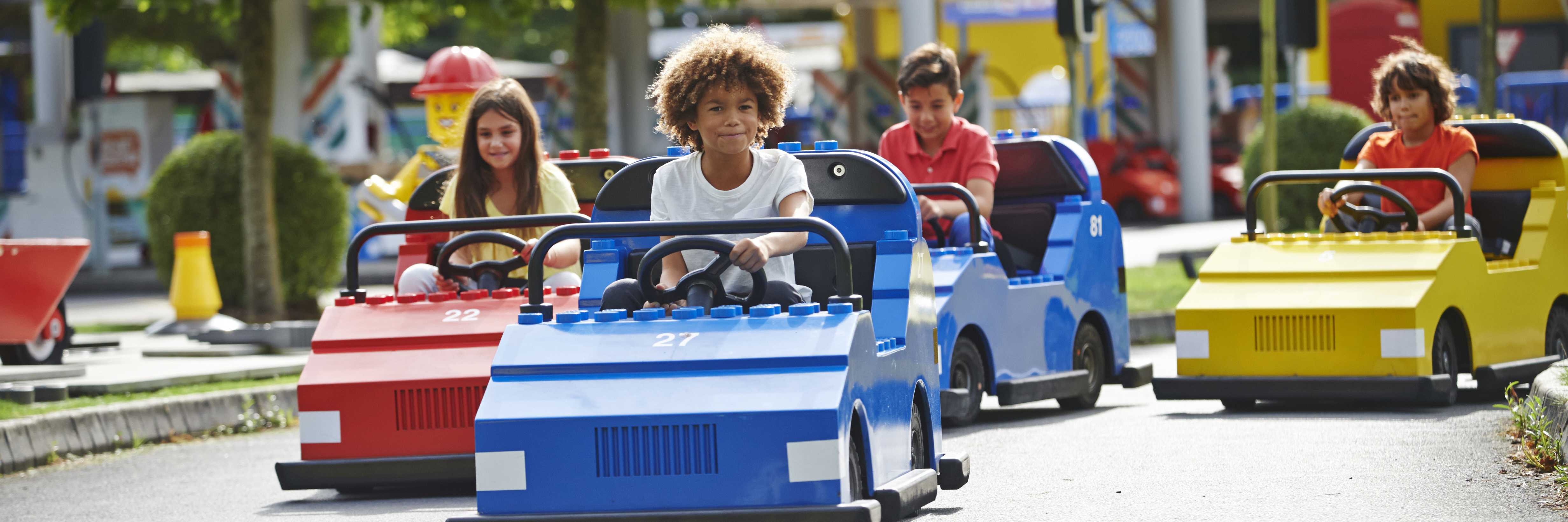 Children driving cars at LEGO City Driving School at the LEGOLAND Windsor Resort