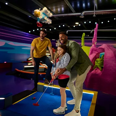 Family playing Space Mission course at LEGOLAND Adventure Golf