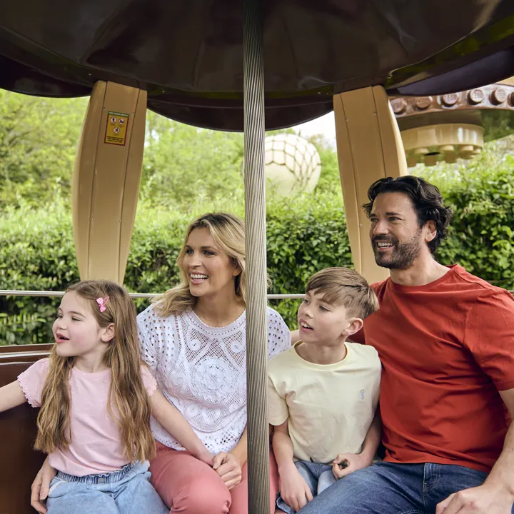 Family looking out to LEGOLAND Windsor on Aero Nomad ferris wheel