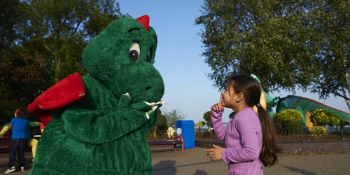 Girl meeting Ollie the Dragon