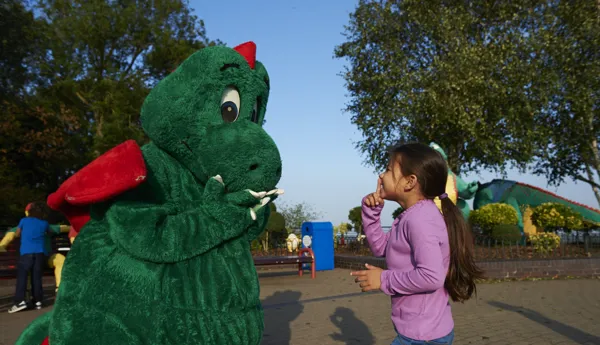 Girl meeting Ollie the Dragon