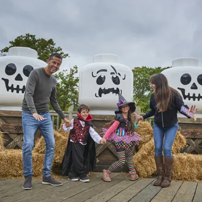 Family With Skeleton Heads At Brick Or Treat
