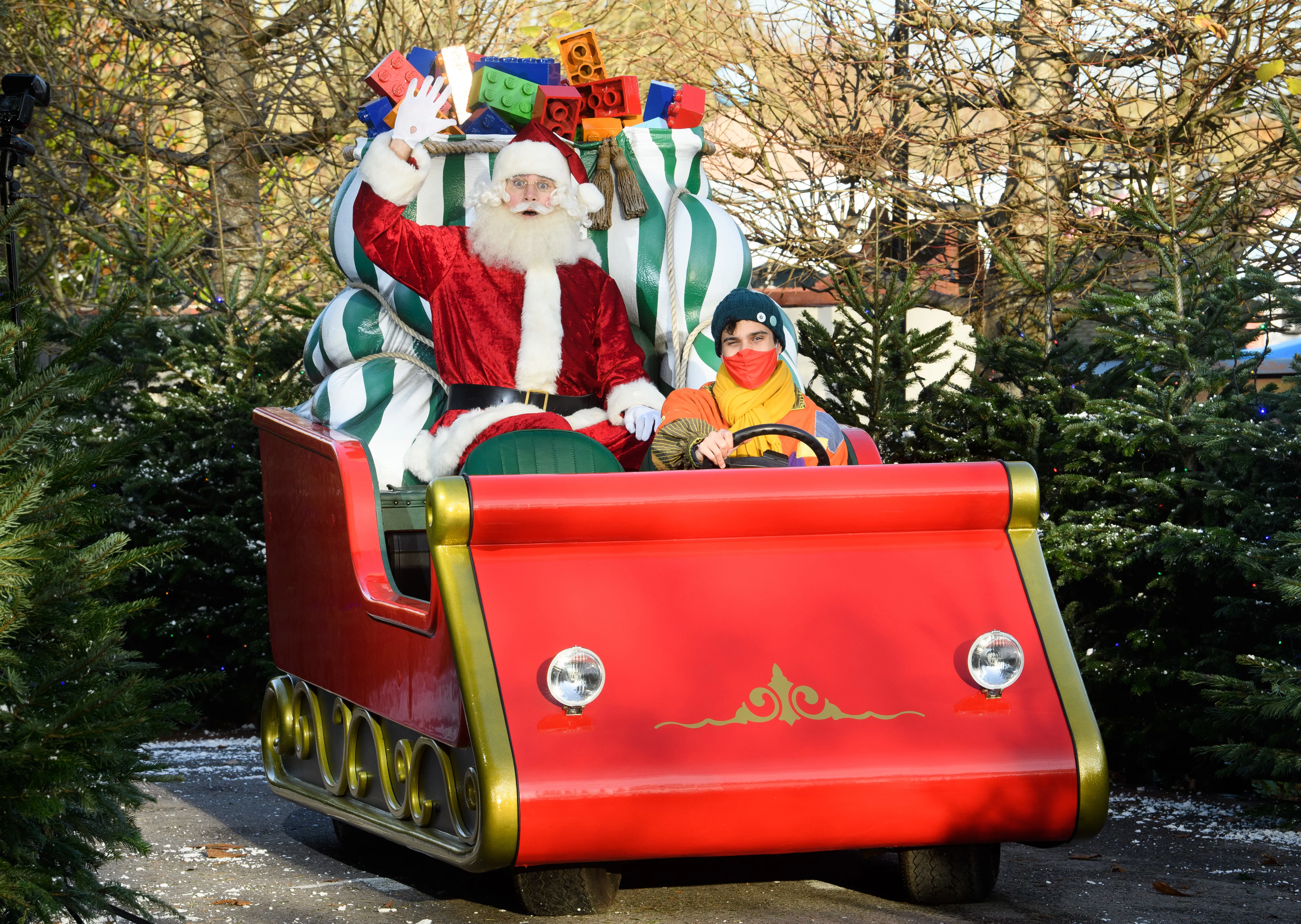 Father Christmas and Elf on Sleigh around LEGOLAND Windsor Resort