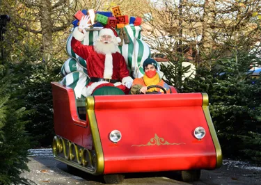 Father Christmas and Elf on Sleigh around LEGOLAND Windsor Resort