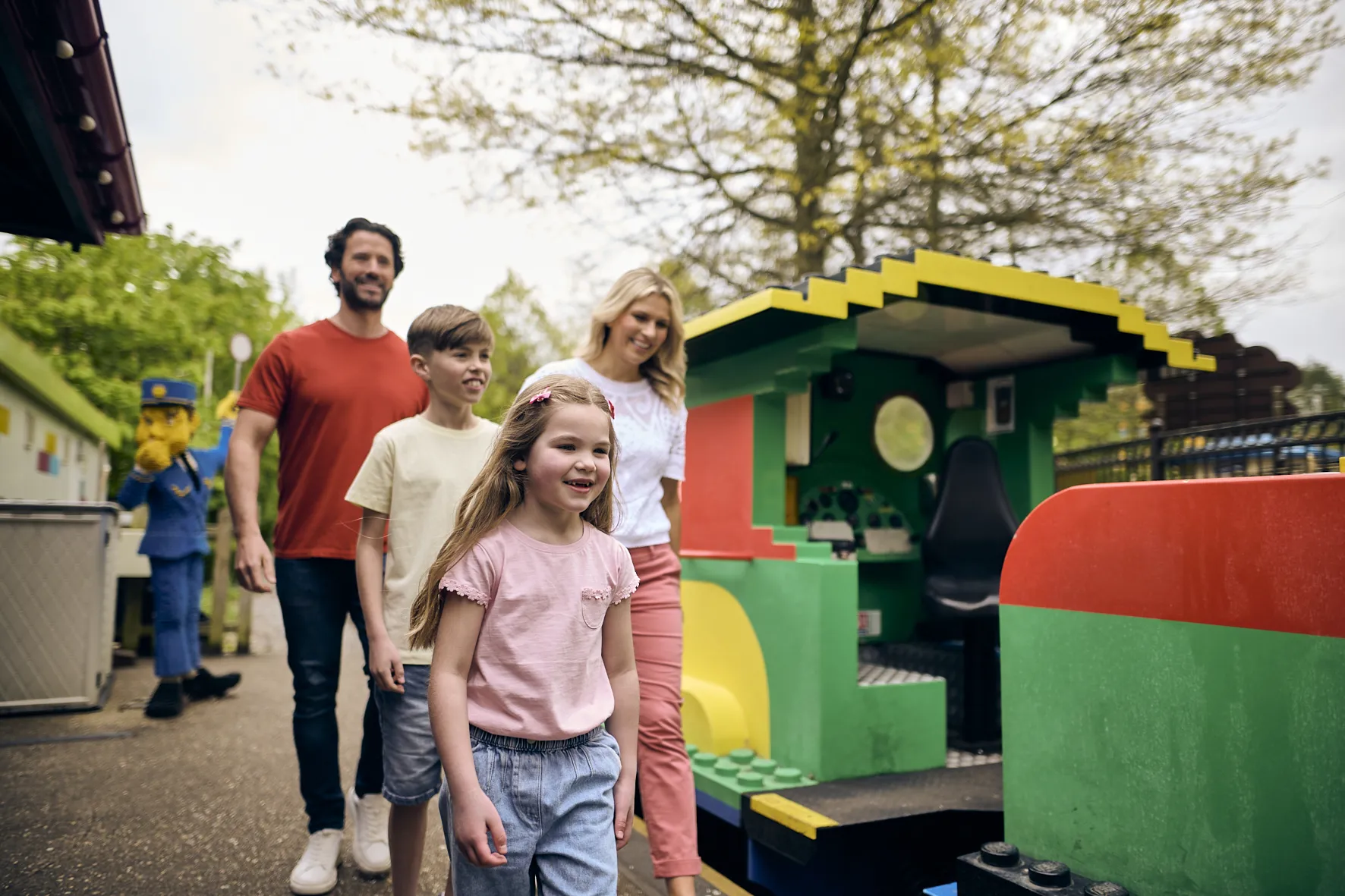Family on platform of LEGOLAND Express train at LEGOLAND Windsor